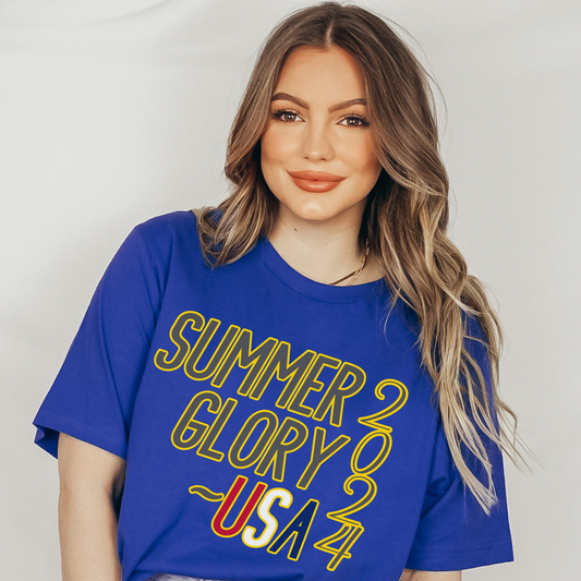 Summer Glory for Gold at the 2024 Summer Games; get ready to immerse yourself in the excitement and camaraderie and celebrate the spirit of international athletics in the Summer 2024 Games with this dynamic and inspirational Bella and Canvas 3001  t-shirt. in Royal Blue 